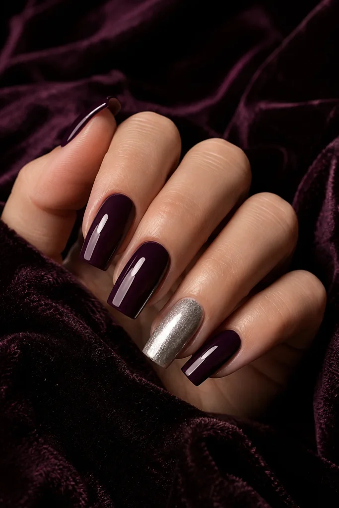Deep plum nails with silver accent nail