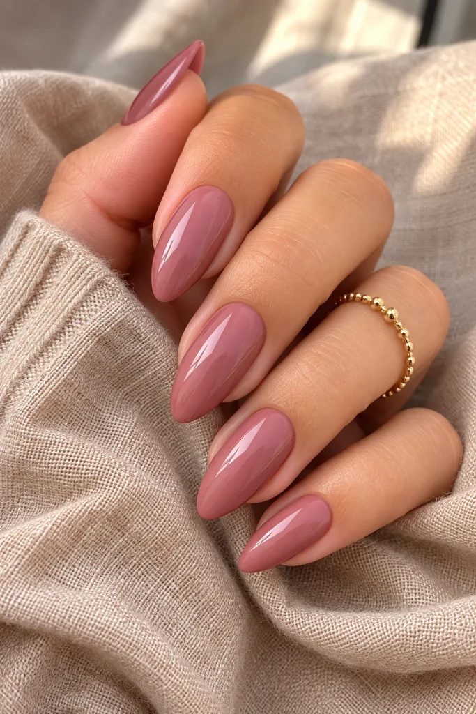 Dusty rose almond nails with a soft fall finish
