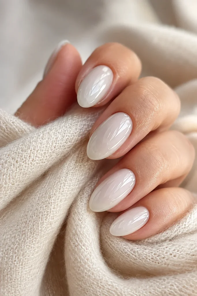 Glazed white donut nails with pearly shine for autumn