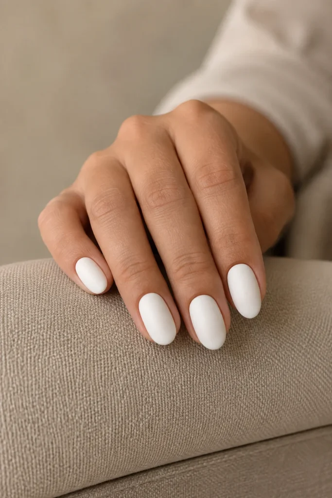Matte white summer nails on short oval nails