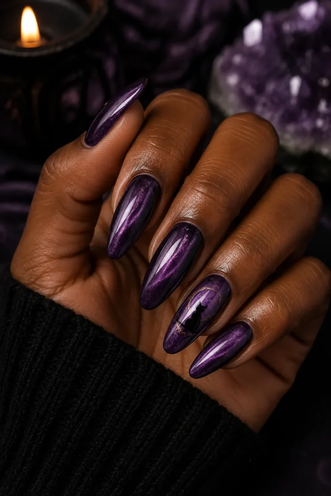 Metallic amethyst nails with a black cat silhouette on crescent moon