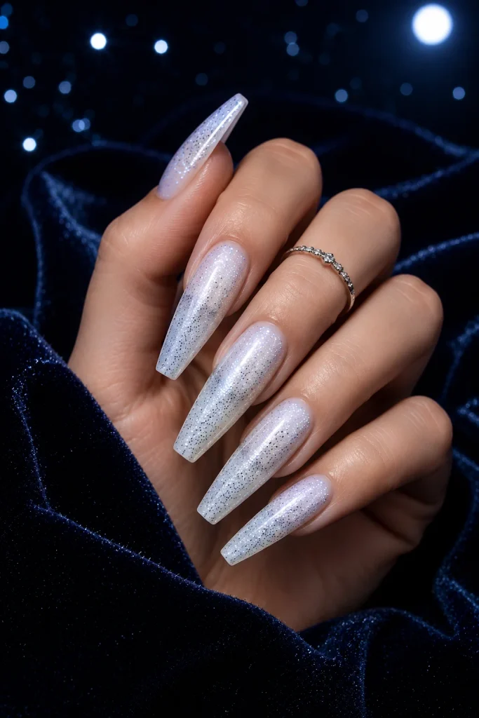Moonlit white cat eye nails with silver flecks