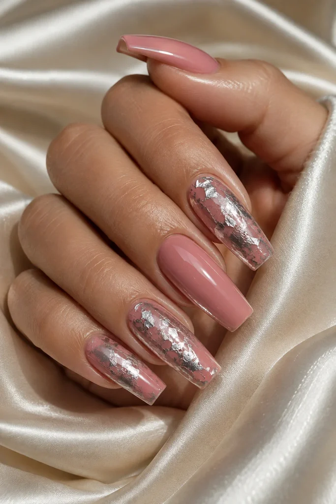 Pink nails with textured silver foil nail art
