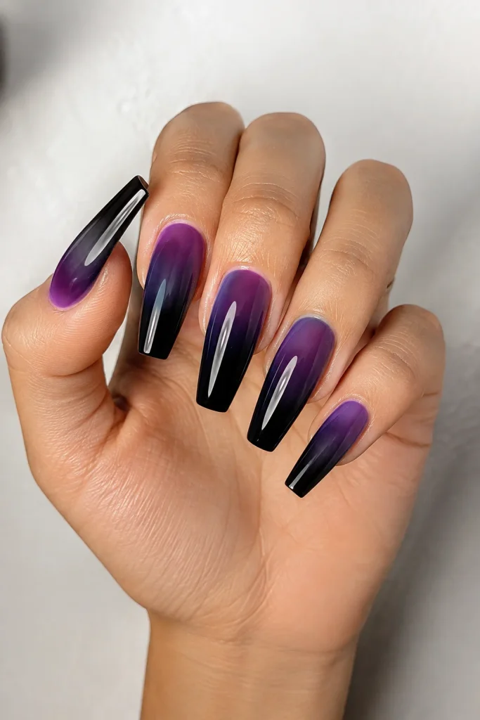 Purple and Black Nail Ideas with a smooth purple to black ombre