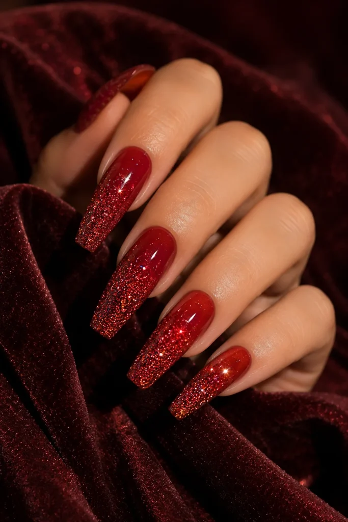 Cascading red glitter ombré Valentine's Day nails on coffin shape