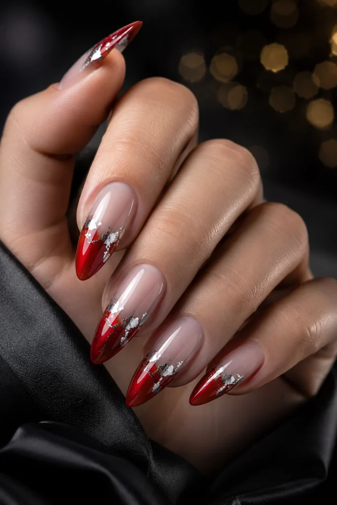 Red French tips with silver foil accents