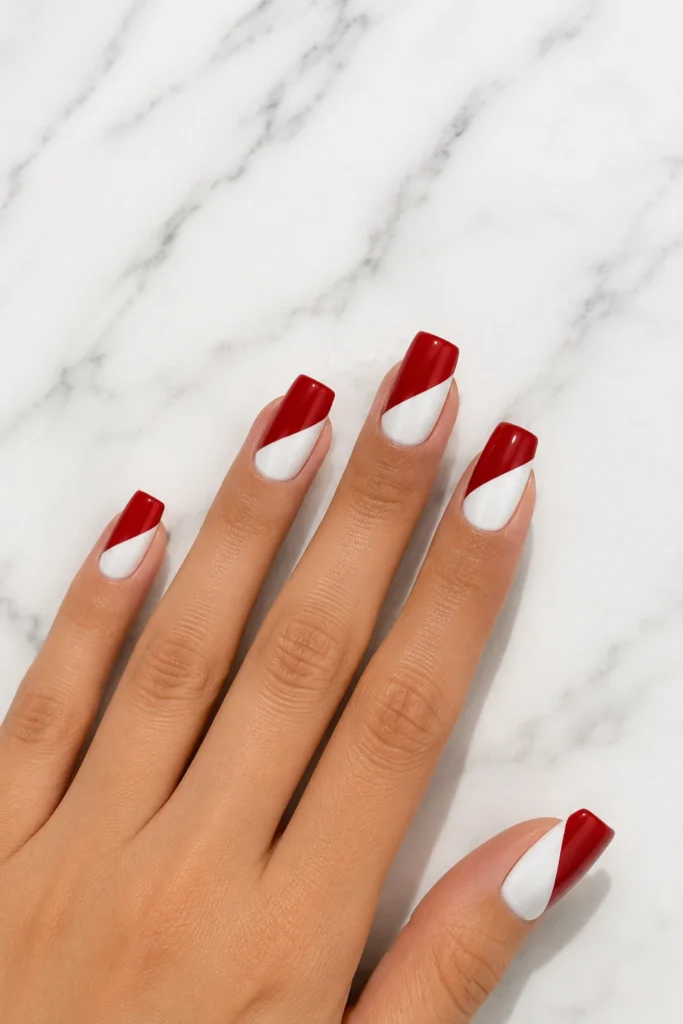 Red and white two-tone wedding nails with clean modern lines