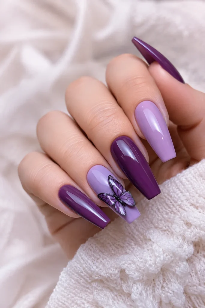 Two tone purple nails with statement butterfly accent