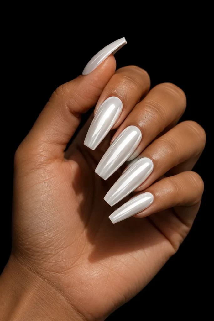 Long white chrome coffin nails with glossy finish