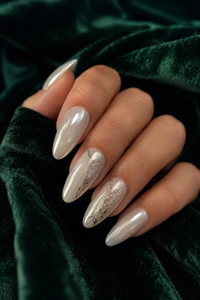 White chrome nails with silver foil details
