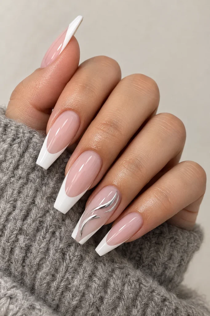 Classic French coffin manicure with detailed accent nail