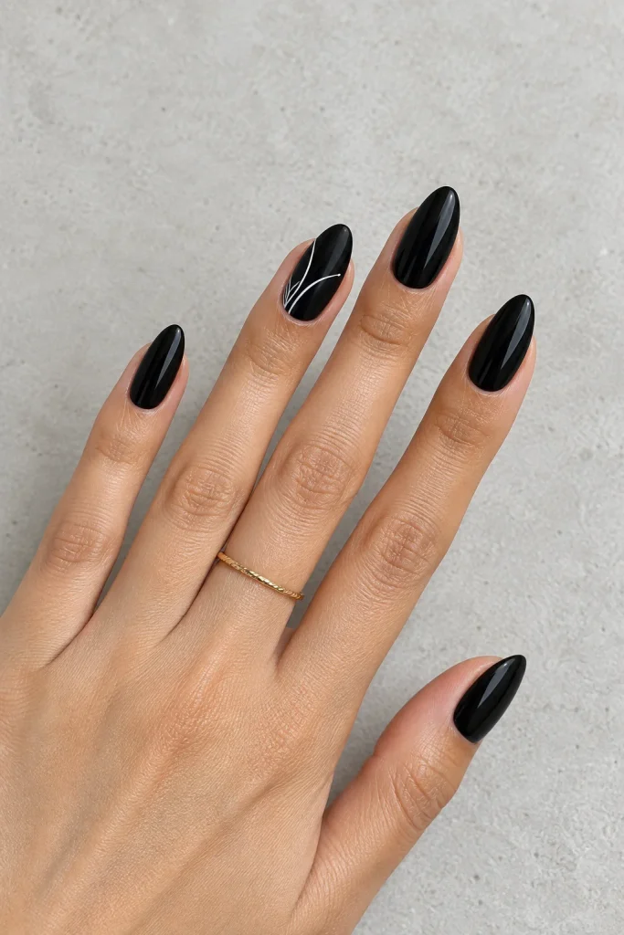 Black almond nails with minimalist line art