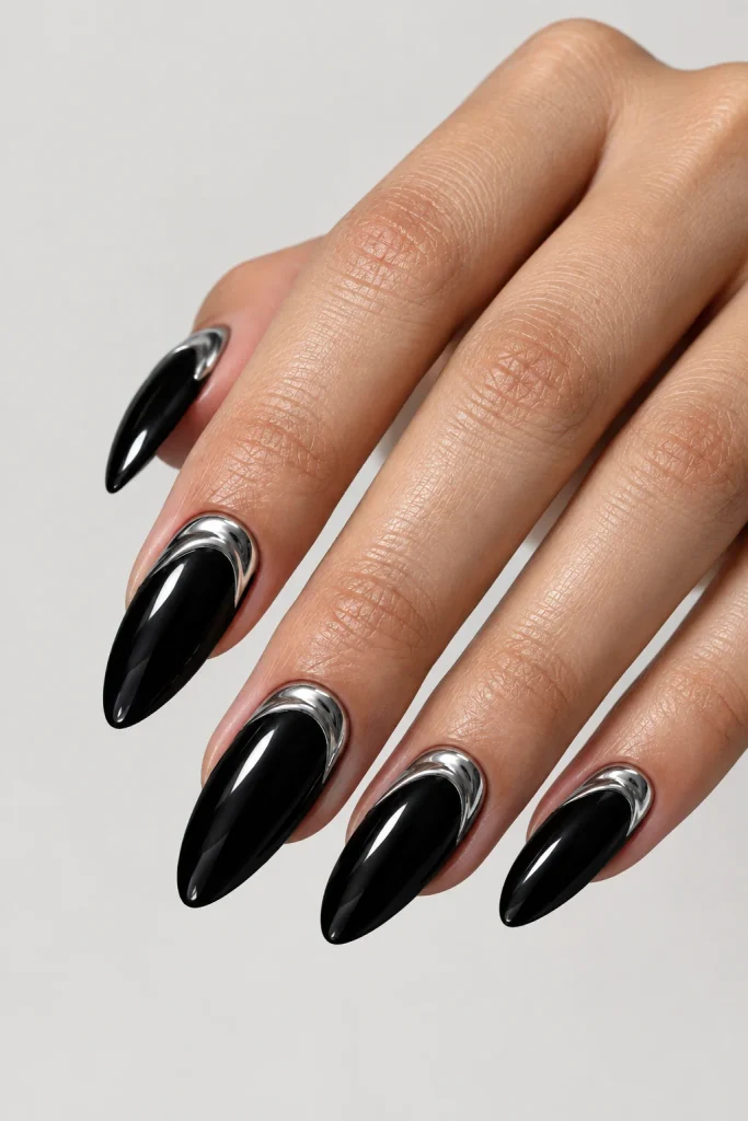 Black almond nails with silver chrome details