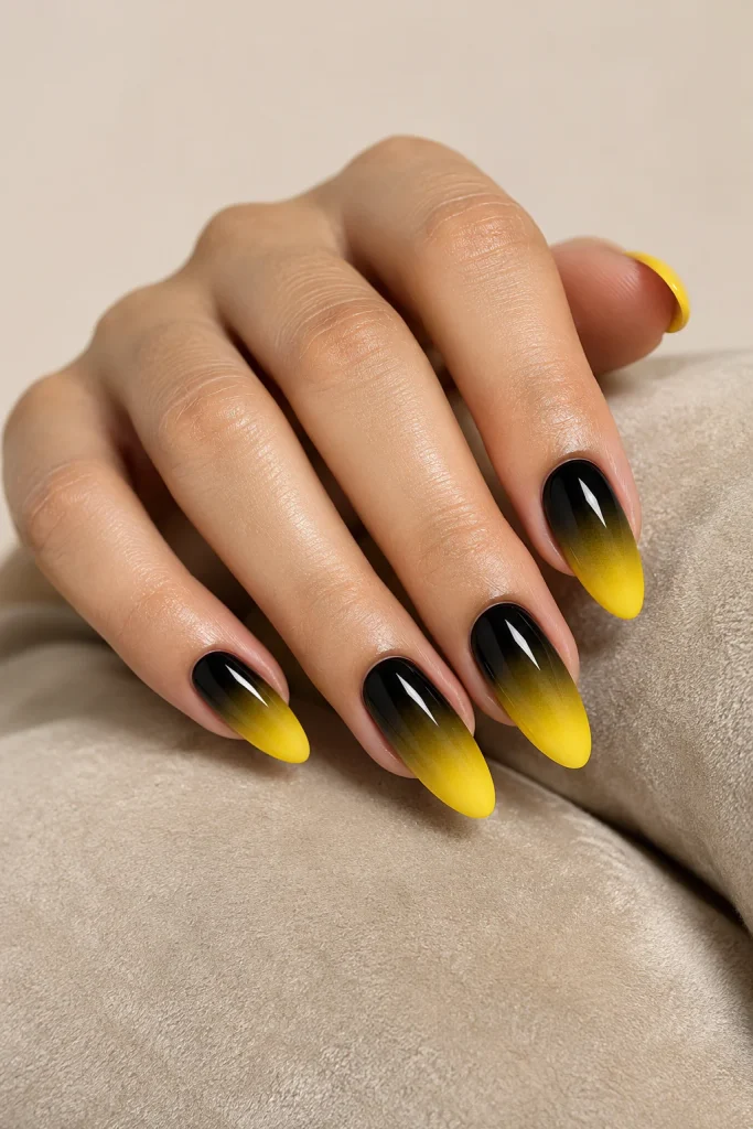 Almond nails with black to yellow ombre fade