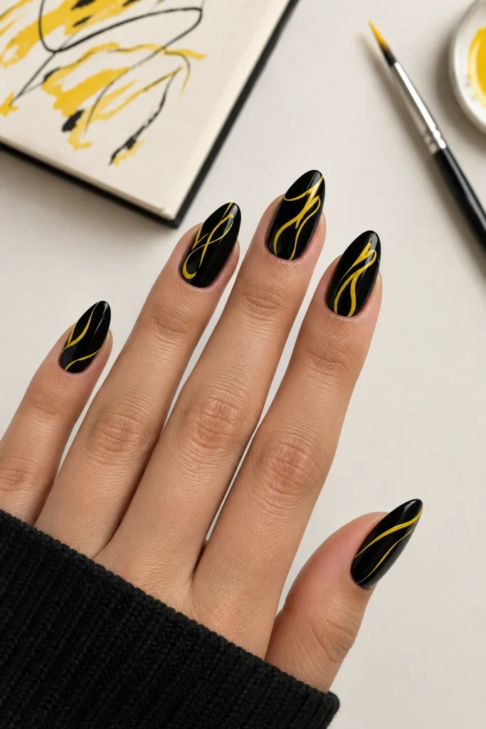 Black nails with thin abstract yellow line art