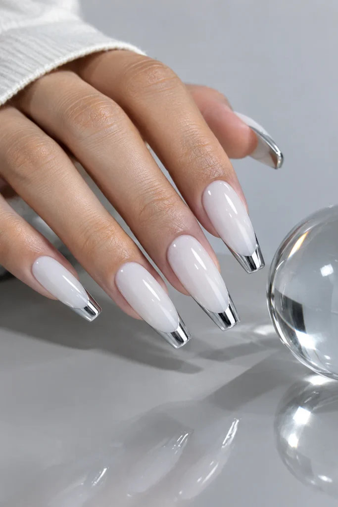 Chrome silver French tips on milky white base