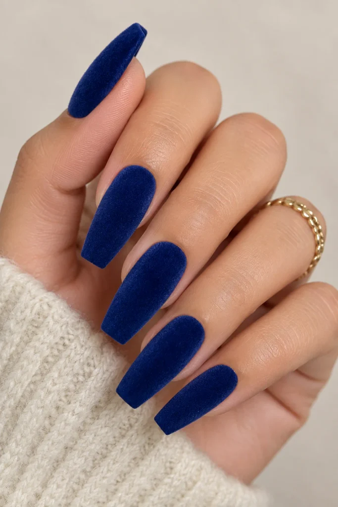 Deep royal blue velvet nails with shifting magnetic finish