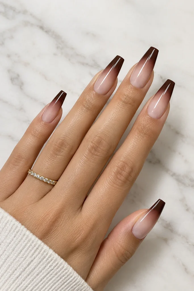 Espresso brown French ombre nails with nude base