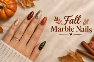 Elegant fall marble nails in cozy autumn colors