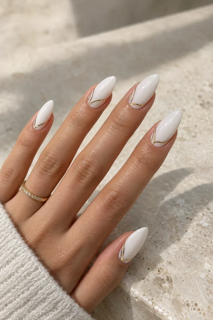 Almond nails with delicate fine line art