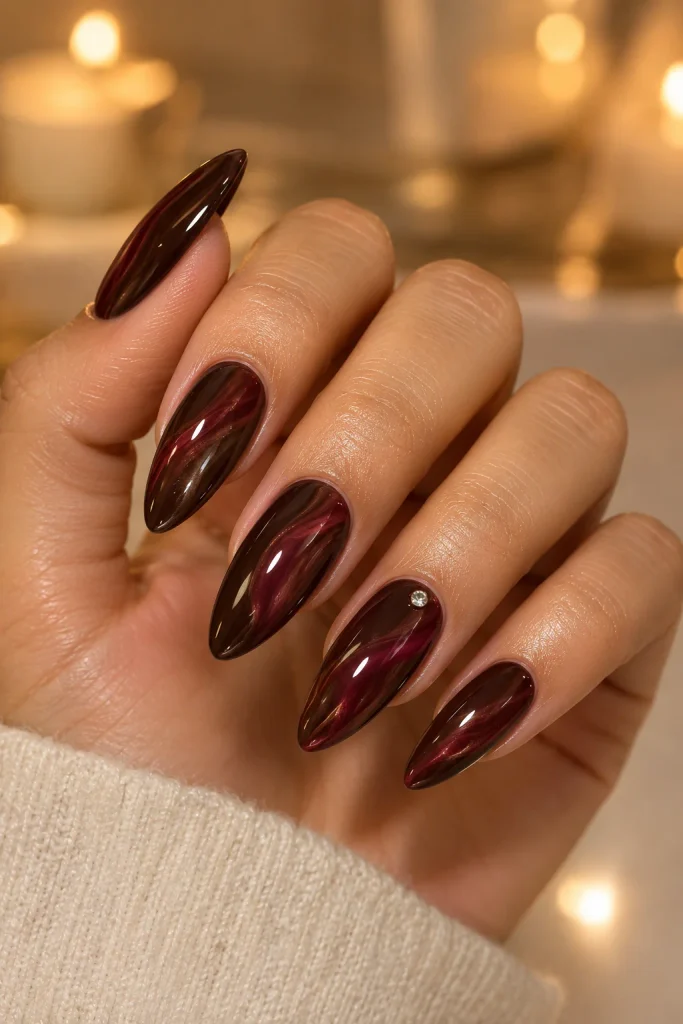 Mahogany cherry glazed swirl nails with deep chocolate and wine tones