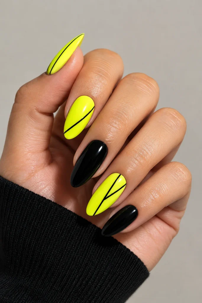 Neon yellow and black contrast nail design
