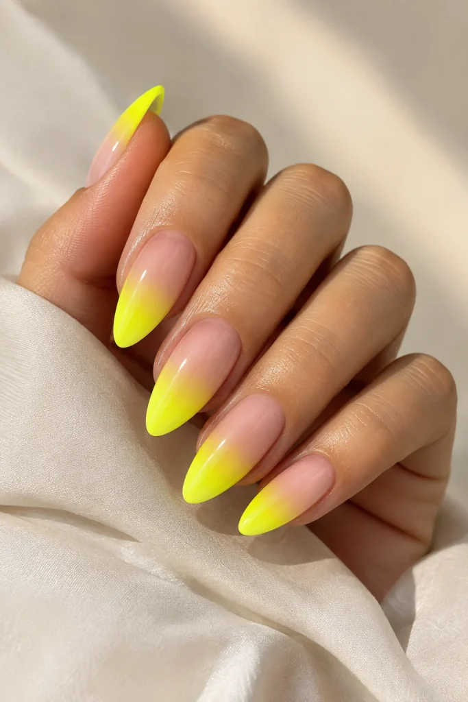 Neon yellow ombre fade nails with nude base