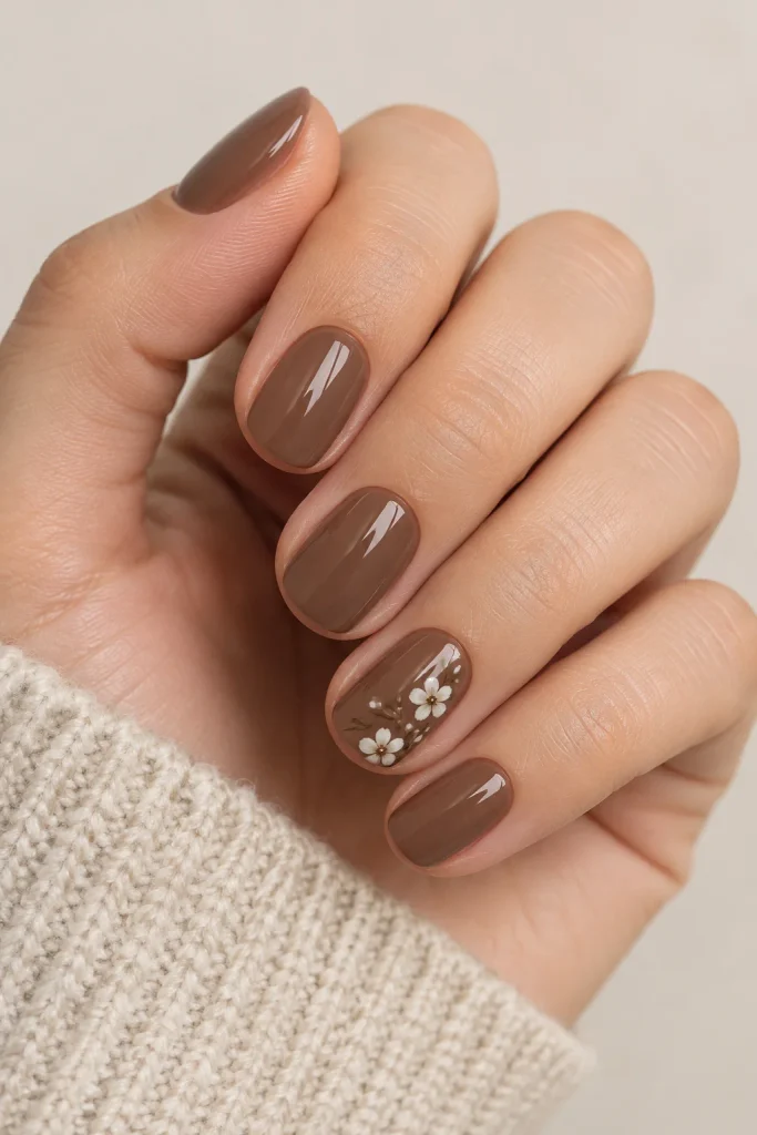 Short nutmeg brown nails with tiny floral details