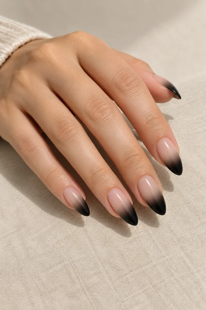 Ombre black almond nails with soft color fade