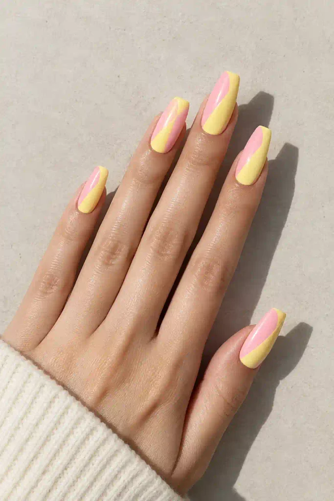 Pink and yellow color block nails with clean sections