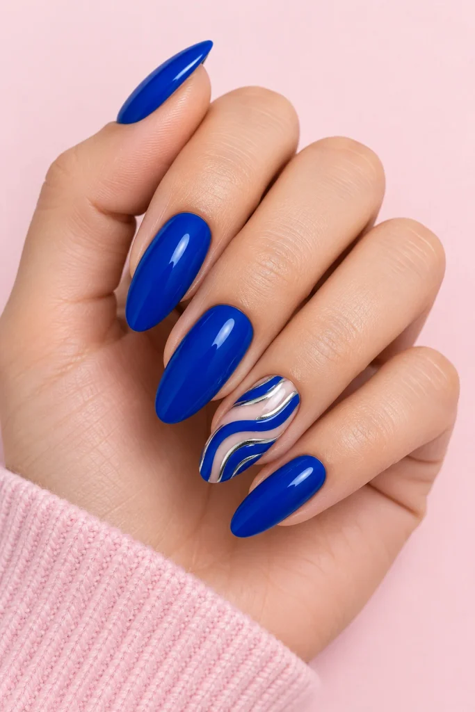 Royal blue nails with one bold statement accent