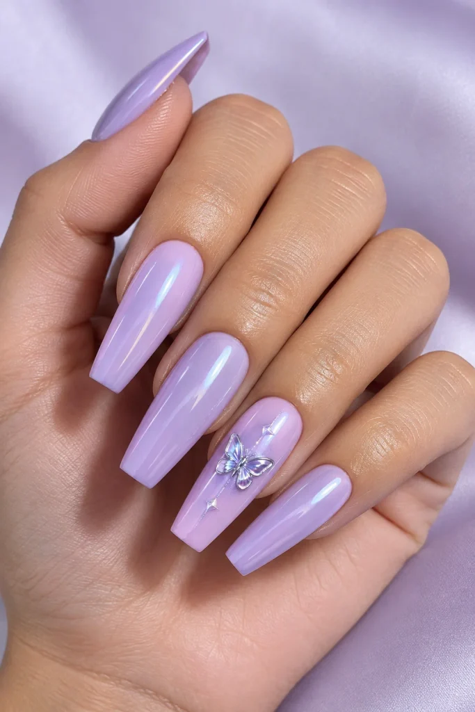 Soft lilac nails with chrome butterfly accents