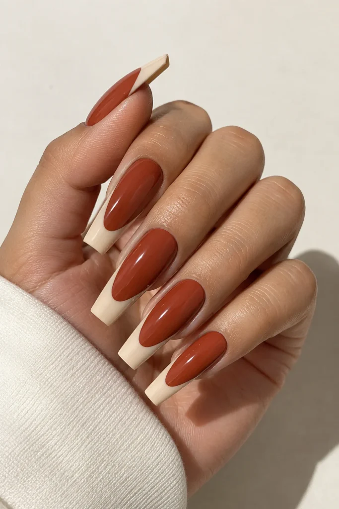 Long coffin nails with bold two-tone French tips