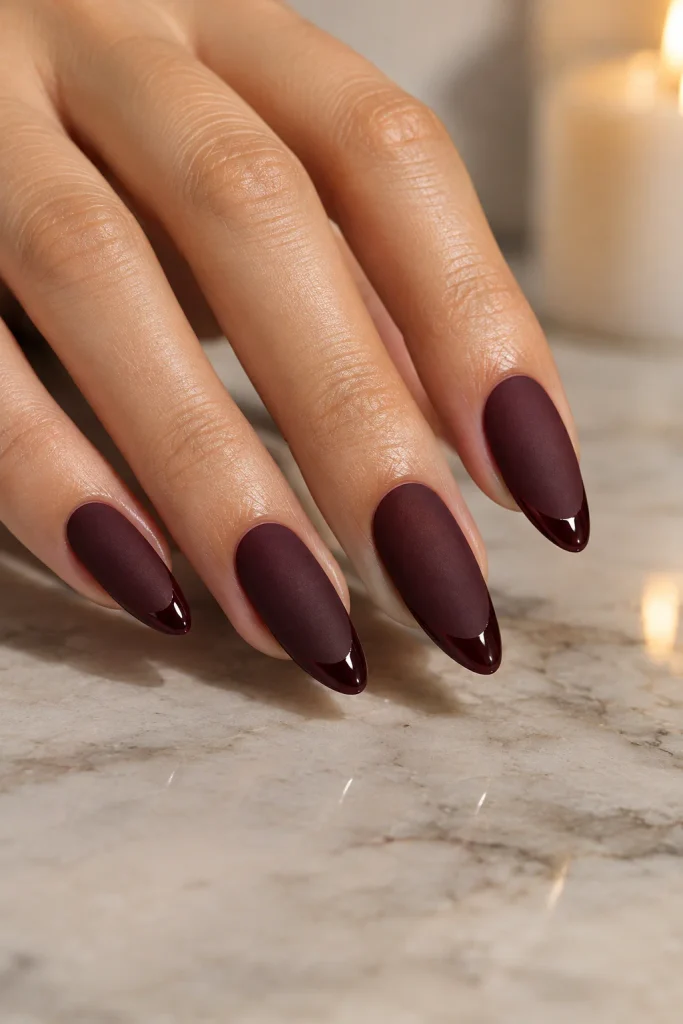 Black cherry matte nails with glossy French tips
