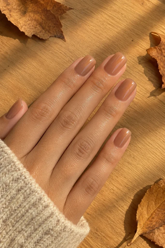 Caramel cream polish on short squoval nude nails