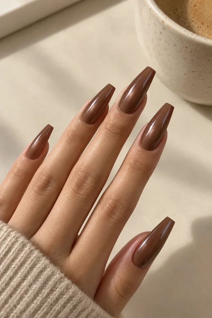 Chocolate glazed coffin nails with a glossy pearl finish