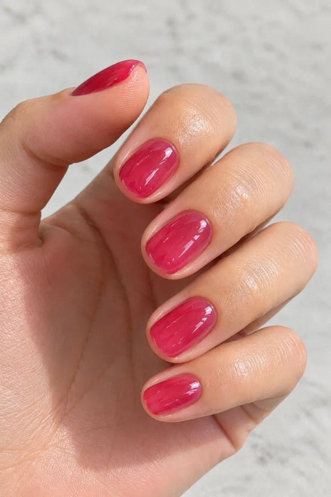 Raspberry pink jelly nails with translucent glossy color