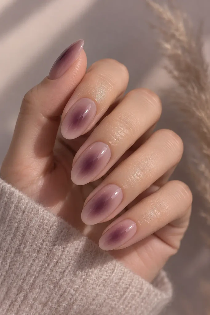 Smoky plum aura nails fading into soft mauve