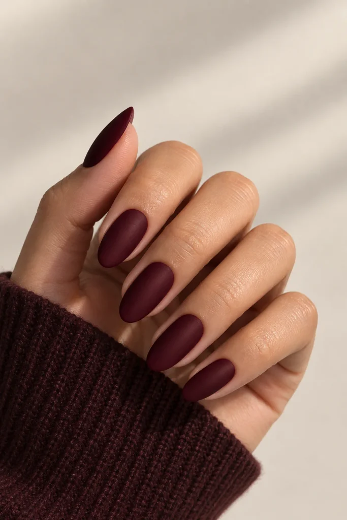 Wine red matte oval nails for autumn